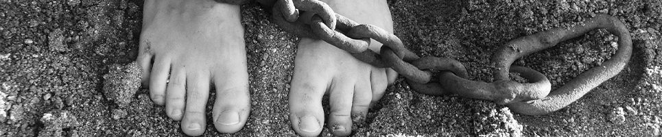 Image of feet bound in chains